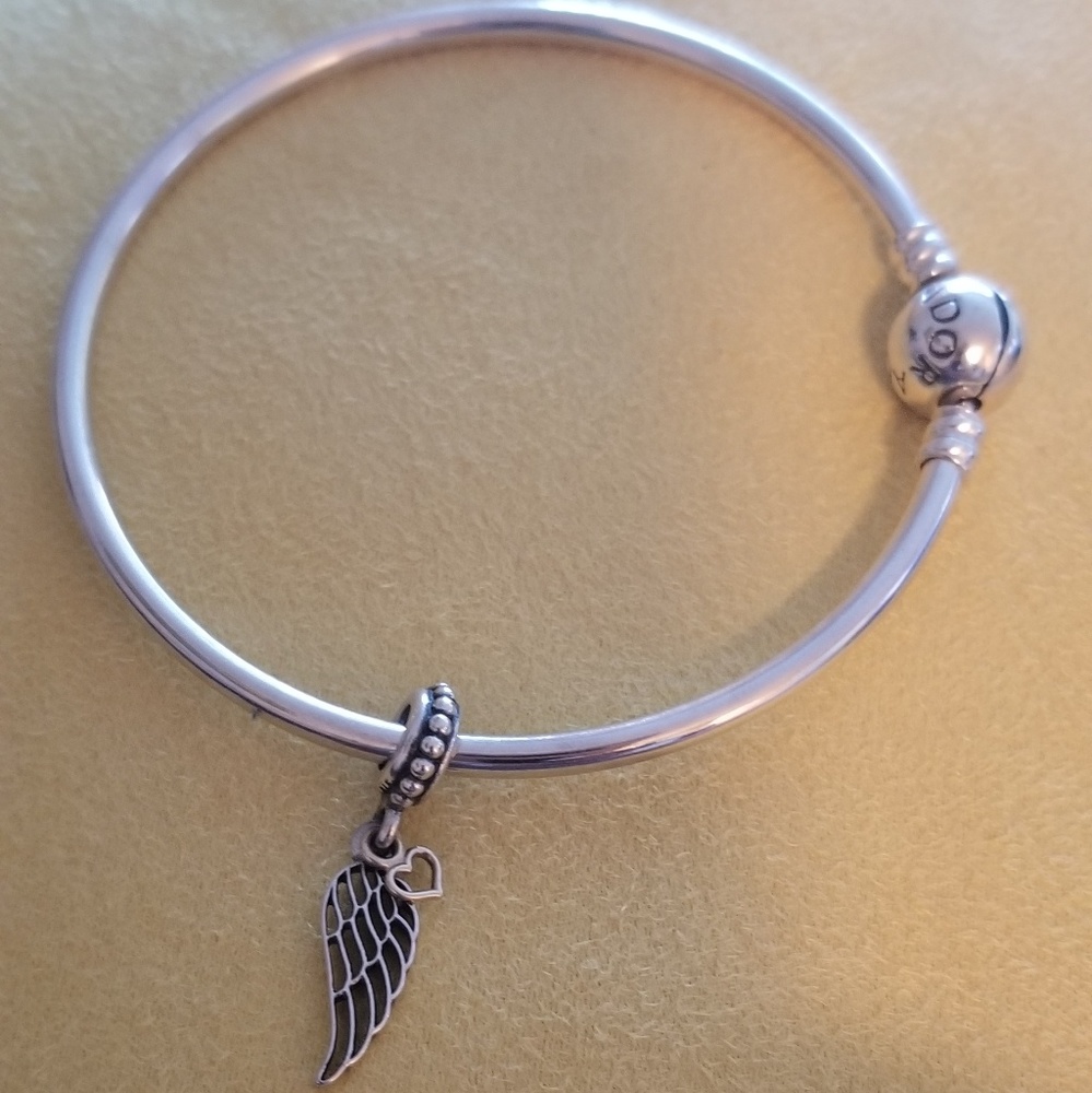 Authentic Pandora bangle &  Love Guidance charm